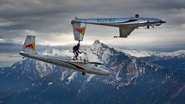 Paul Steiner of the Red Bull Skydive Team, performs a daring mid-air stunt. Picture: Markus Zinner - Lincolnshire Magazine - LincsMag.com