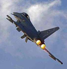 Station Commander of RAF Coningsby lifts off in the 100th Typhoon to leave the Air Station. - Crown Copyright - Photo: SAC Scott Lewis/MoD - 2012 Olympic Games Military Support - Lincolnshire Magazine - LincsMag.com