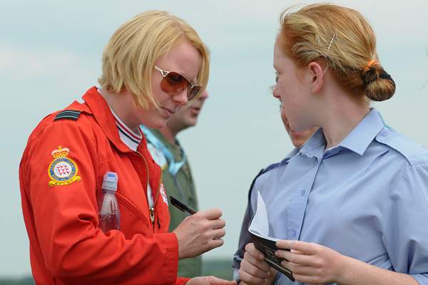 Another great local attraction at the show was Flt Lt Kirsty Moore, better known as Red 5, the first female pilot to be accepted into the Red Arrows Aerobatic display team; seen here signing autographs for air cadets who were excited to see her and the team arrive at the show following their stunning routine. - Image Copyright R.J.Heard/Focalplane Photography